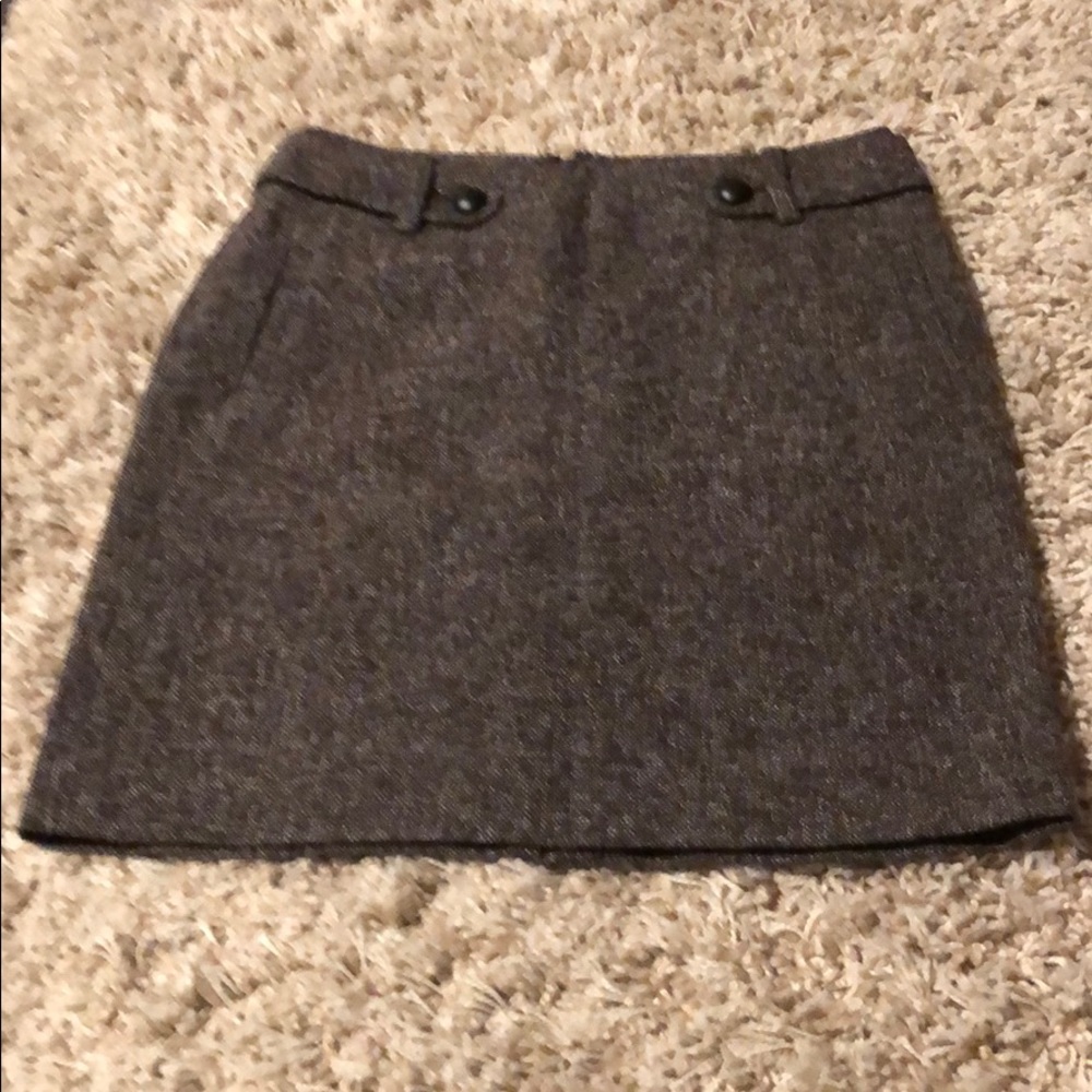Brown skirt with two buttons on the front